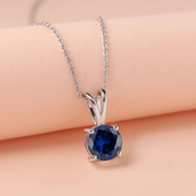 V-Bale Round Blue Sapphire Solitaire Pendant Without Chain in 10K/14K gold and platinum with certified lab-grown or natural diamonds