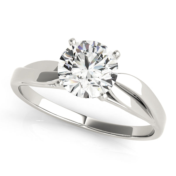 Iconic Solitaires Round Diamond Engagement Ring in 10K/14K gold and platinum with certified lab-grown or natural diamonds