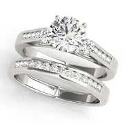 Refined Three-Stone Round Diamond Engagement Ring in 10K/14K gold and platinum with certified lab-grown or natural diamonds