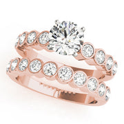 Graceful Bezel-Set Round Diamond Engagement Ring in 10K/14K gold and platinum with certified lab-grown or natural diamonds
