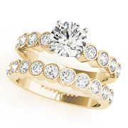 Graceful Bezel-Set Round Diamond Engagement Ring in 10K/14K gold and platinum with certified lab-grown or natural diamonds