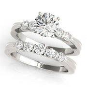 Sophisticated Prong-Set Round Diamond Engagement Ring in 10K/14K gold and platinum with certified lab-grown or natural diamonds