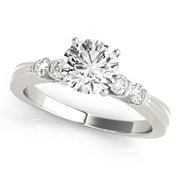 Sophisticated Prong-Set Round Diamond Engagement Ring in 10K/14K gold and platinum with certified lab-grown or natural diamonds