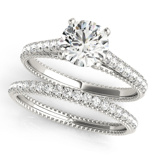 Crowned Prong-Set Round Diamond Engagement Ring in 10K/14K gold and platinum with certified lab-grown or natural diamonds