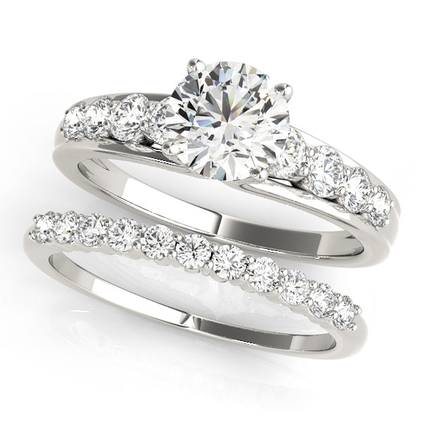 Iconic Prong-Set Round Diamond Engagement Ring in 10K/14K gold and platinum with certified lab-grown or natural diamonds