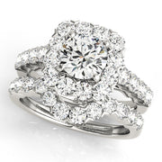 Pristine Halo Round Diamond Engagement Ring in 10K/14K gold and platinum with certified lab-grown or natural diamonds