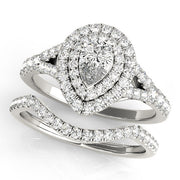 Noble Halo Pear Diamond Engagement Ring in 10K/14K gold and platinum with certified lab-grown or natural diamonds