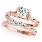 Regal With Twisted Shank Round Diamond Engagement Ring in 10K/14K gold and platinum with certified lab-grown or natural diamonds