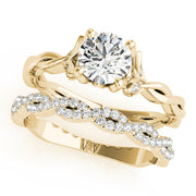 Regal With Twisted Shank Round Diamond Engagement Ring in 10K/14K gold and platinum with certified lab-grown or natural diamonds