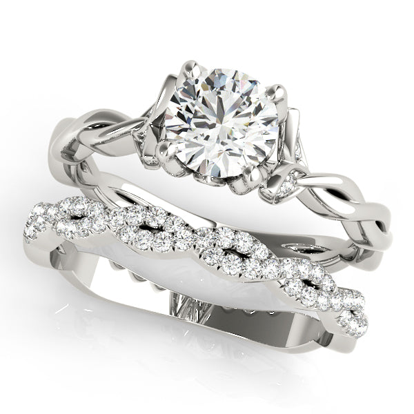 Regal With Twisted Shank Round Diamond Engagement Ring in 10K/14K gold and platinum with certified lab-grown or natural diamonds