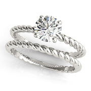 Signature Twisted Shank Center Round Diamond Engagement Ring in 10K/14K gold and platinum with certified lab-grown or natural diamonds