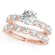 Refined U Prong Round Diamond Engagement Ring in 10K/14K gold and platinum with certified lab-grown or natural diamonds
