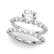 Majestic Single Row Shared Pr Eng Ring Round Diamond Engagement Ring in 10K/14K gold and platinum with certified lab-grown or natural diamonds
