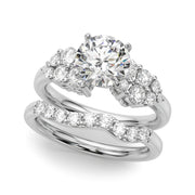 Signature Sidestone Round Diamond Engagement Ring in 10K/14K gold and platinum with certified lab-grown or natural diamonds