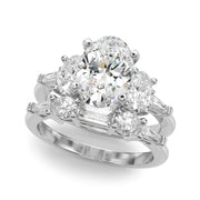 Iconic Tapered Baguette Sides Oval Diamond Engagement Ring in 10K/14K gold and platinum with certified lab-grown or natural diamonds