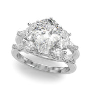 Iconic Tapered Baguette Sides Oval Diamond Engagement Ring in 10K/14K gold and platinum with certified lab-grown or natural diamonds