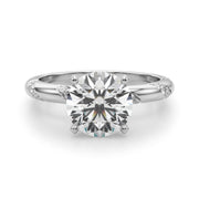 Regal Sidestone Round Diamond Engagement Ring in 10K/14K gold and platinum with certified lab-grown or natural diamonds