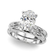 Regal Sidestone Round Diamond Engagement Ring in 10K/14K gold and platinum with certified lab-grown or natural diamonds
