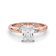 Regal Sidestone Round Diamond Engagement Ring in 10K/14K gold and platinum with certified lab-grown or natural diamonds