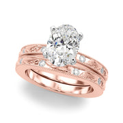 Sophisticated Sidestone Round Diamond Engagement Ring in 10K/14K gold and platinum with certified lab-grown or natural diamonds