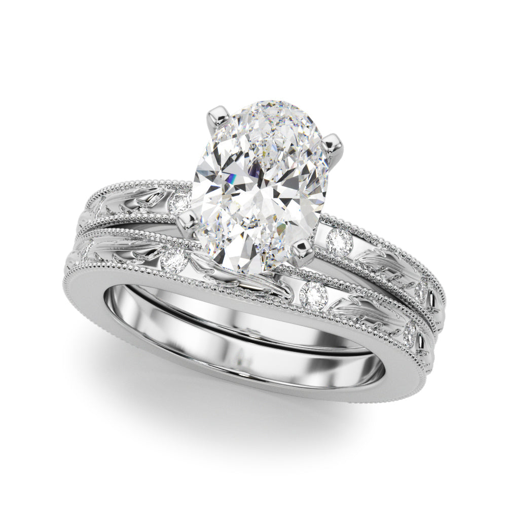 Sophisticated Sidestone Round Diamond Engagement Ring in 10K/14K gold and platinum with certified lab-grown or natural diamonds