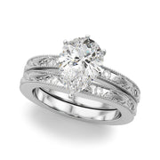 Sophisticated Sidestone Round Diamond Engagement Ring in 10K/14K gold and platinum with certified lab-grown or natural diamonds