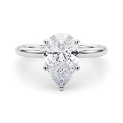 Iconic Sidestone Pear Diamond Engagement Ring â€” 10K/14K Gold & Platinum