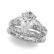 Enchanted Center Round Diamond Engagement Ring in 10K/14K gold and platinum with certified lab-grown or natural diamonds
