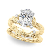Adored Sidestone Round Diamond Engagement Ring in 10K/14K gold and platinum with certified lab-grown or natural diamonds
