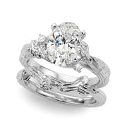 Adored Sidestone Round Diamond Engagement Ring in 10K/14K gold and platinum with certified lab-grown or natural diamonds