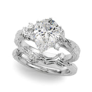 Adored Sidestone Round Diamond Engagement Ring in 10K/14K gold and platinum with certified lab-grown or natural diamonds