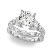 Noble Sidestone Round Diamond Engagement Ring in 10K/14K gold and platinum with certified lab-grown or natural diamonds