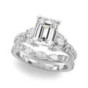 Noble Sidestone Round Diamond Engagement Ring in 10K/14K gold and platinum with certified lab-grown or natural diamonds