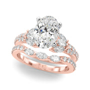 Noble Sidestone Round Diamond Engagement Ring in 10K/14K gold and platinum with certified lab-grown or natural diamonds