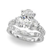 Noble Sidestone Round Diamond Engagement Ring in 10K/14K gold and platinum with certified lab-grown or natural diamonds