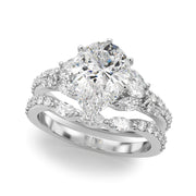 Noble Sidestone Round Diamond Engagement Ring in 10K/14K gold and platinum with certified lab-grown or natural diamonds