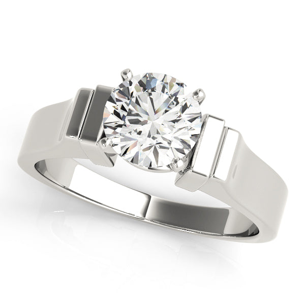 Noble Solitaires Round Diamond Engagement Ring in 10K/14K gold and platinum with certified lab-grown or natural diamonds