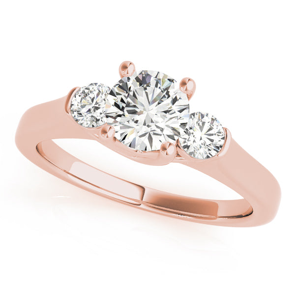 Dazzling Three-Stone Round Diamond Engagement Ring in 10K/14K gold and platinum with certified lab-grown or natural diamonds