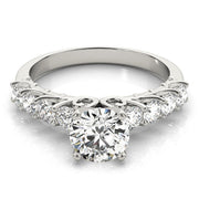 Graceful Prong-Set Round Diamond Engagement Ring in 10K/14K gold and platinum with certified lab-grown or natural diamonds