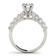 Graceful Prong-Set Round Diamond Engagement Ring in 10K/14K gold and platinum with certified lab-grown or natural diamonds