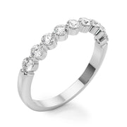 Single Shared Prong Half Eternity Ring in Gold & Platinum