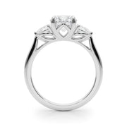 Round & Pear Three-Stone Diamond Engagement Ring in 10K/14K gold and platinum with certified lab-grown or natural diamonds