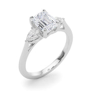 Emerald Cut Three-Stone Diamond Engagement Ring with Pear Side Stones in 10K/14K gold and platinum with certified lab-grown or natural diamonds