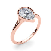 Noble Solitaire Ps Bezel Set Pear Diamond Engagement Ring in 10K/14K gold and platinum with certified lab-grown or natural diamonds