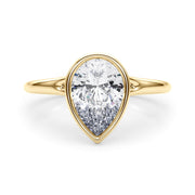 Noble Solitaire Ps Bezel Set Pear Diamond Engagement Ring in 10K/14K gold and platinum with certified lab-grown or natural diamonds