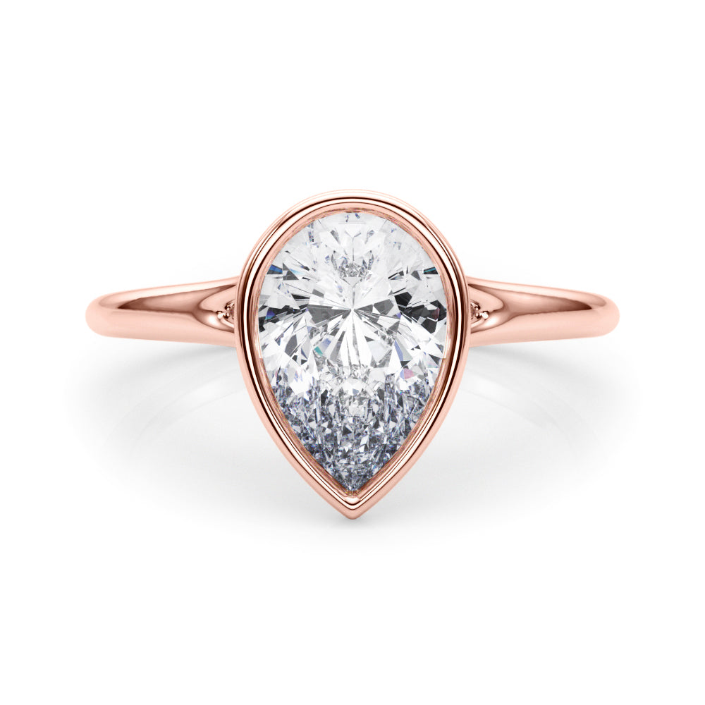 Noble Solitaire Ps Bezel Set Pear Diamond Engagement Ring in 10K/14K gold and platinum with certified lab-grown or natural diamonds