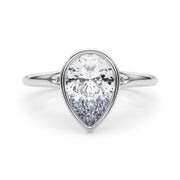 Noble Solitaire Ps Bezel Set Pear Diamond Engagement Ring in 10K/14K gold and platinum with certified lab-grown or natural diamonds
