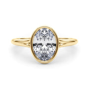Vintage-Inspired Solitaire Oval Bezel Set Oval Diamond Engagement Ring in 10K/14K gold and platinum with certified lab-grown or natural diamonds