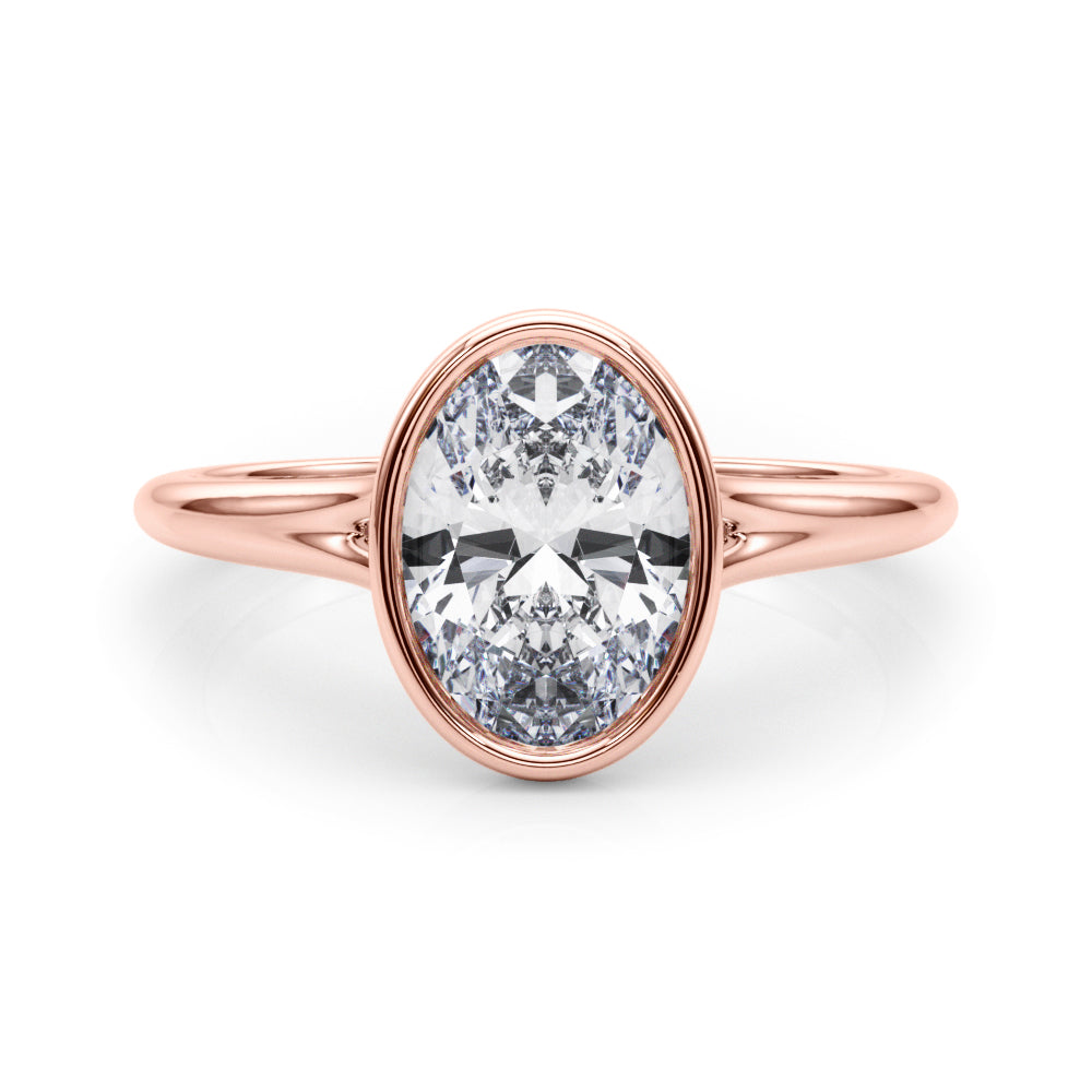 Vintage-Inspired Solitaire Oval Bezel Set Oval Diamond Engagement Ring in 10K/14K gold and platinum with certified lab-grown or natural diamonds