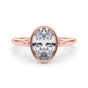 Vintage-Inspired Solitaire Oval Bezel Set Oval Diamond Engagement Ring in 10K/14K gold and platinum with certified lab-grown or natural diamonds